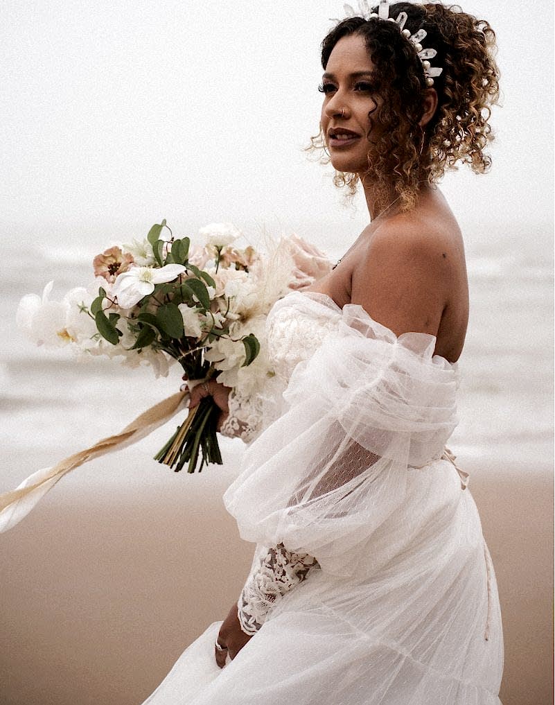 bride in a wedding dress on a beach