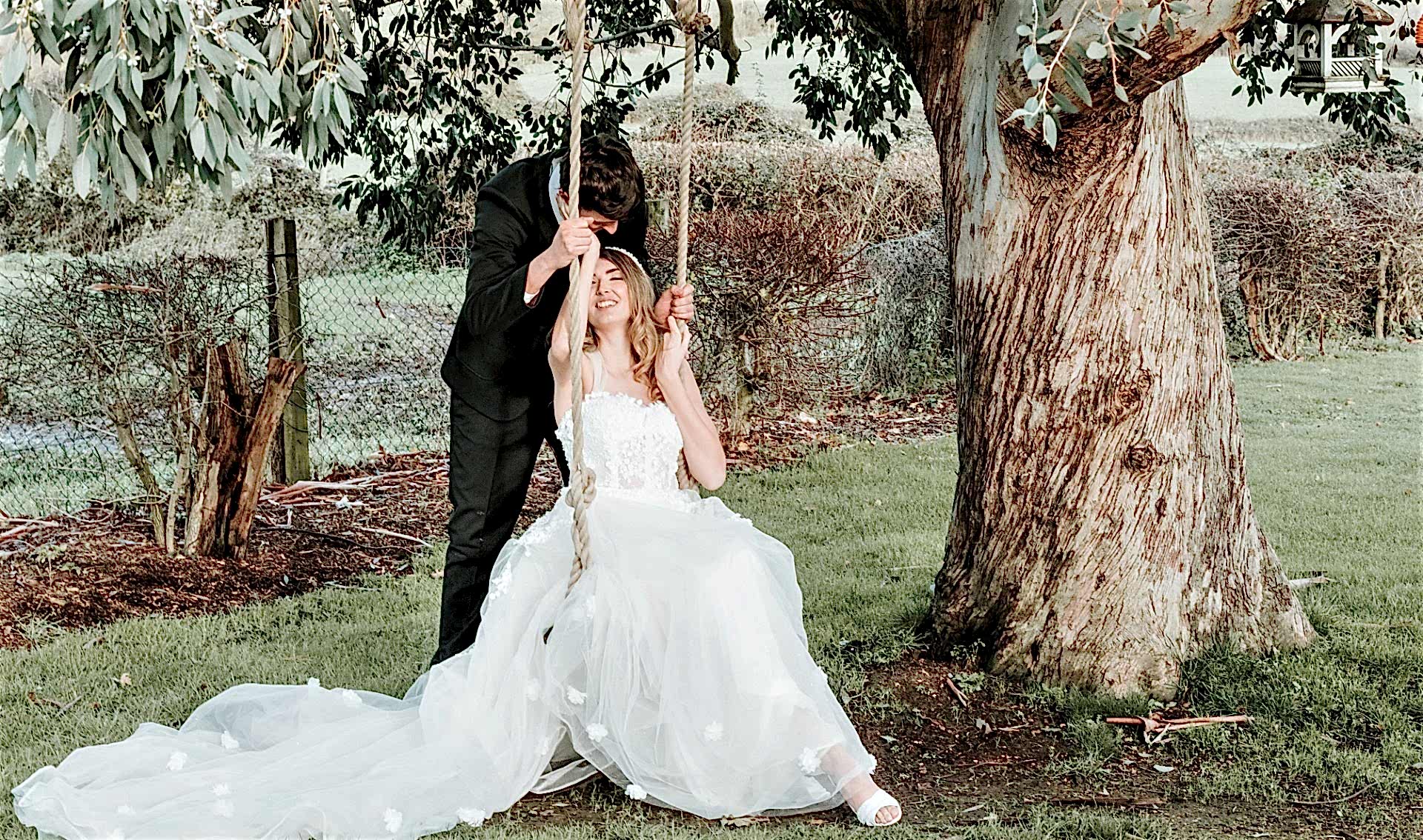 newly weds on swing