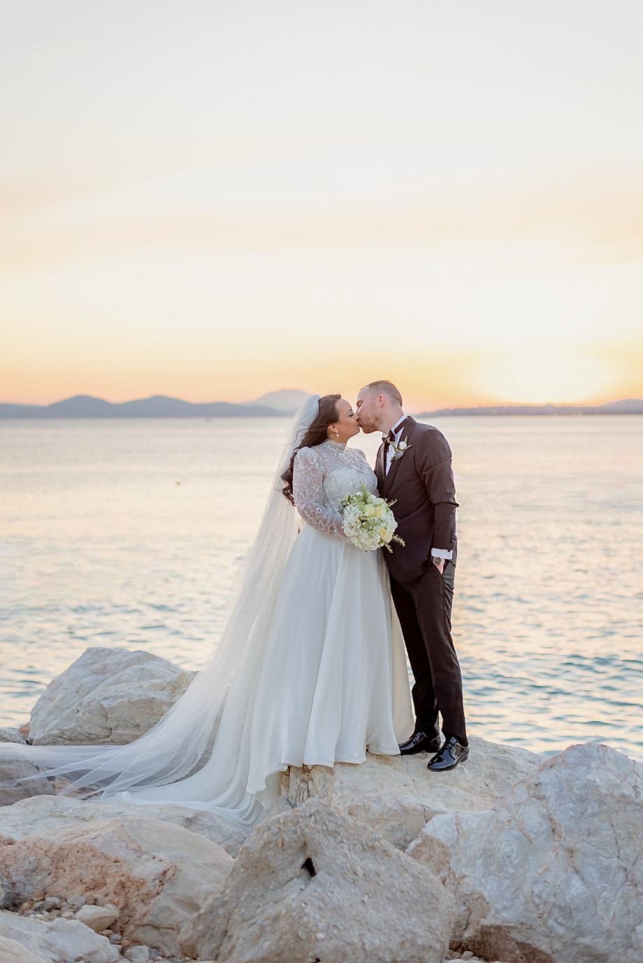 bride and groom by sunset